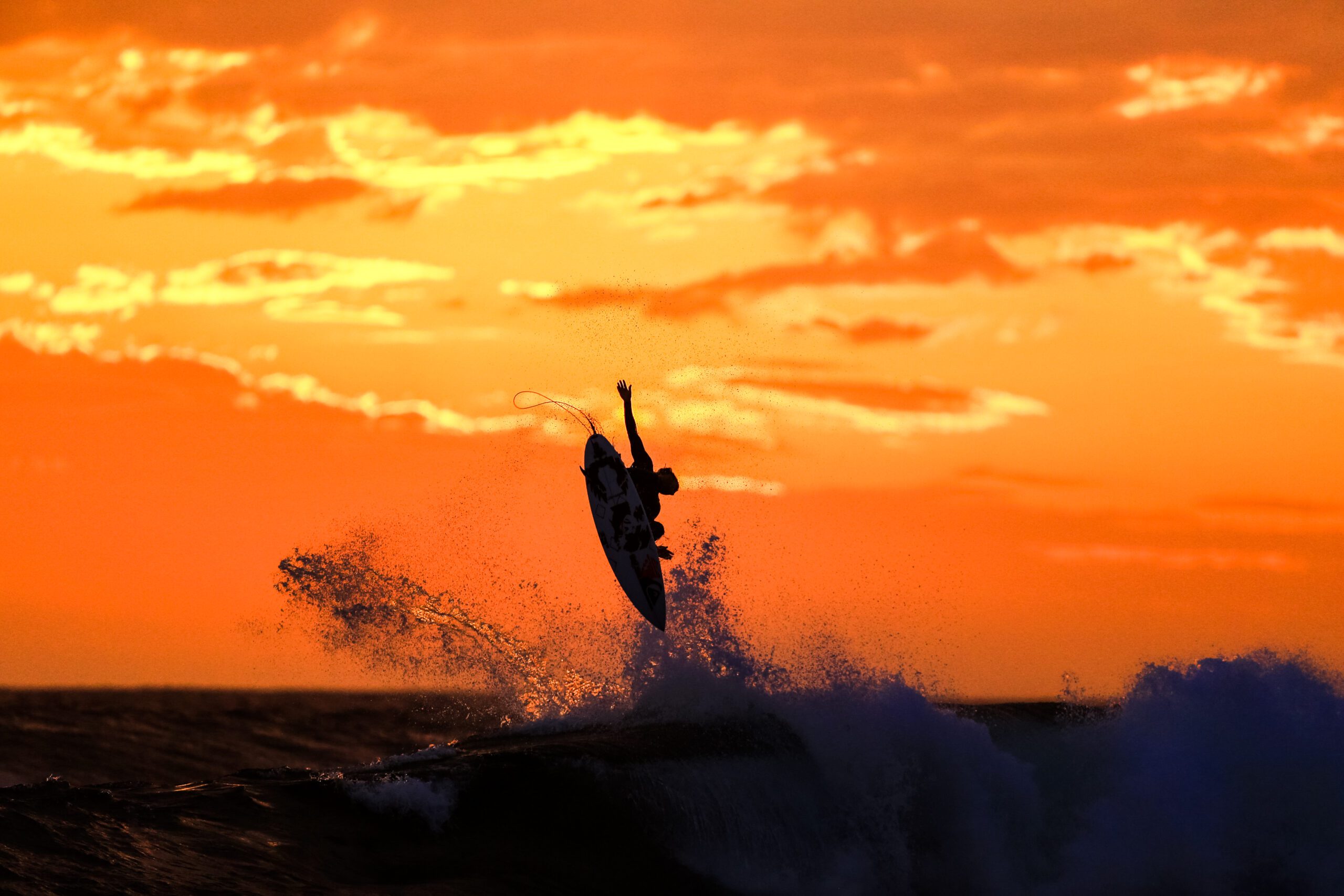 surfing on the sunset